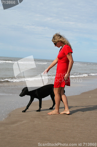 Image of women in red and black dog