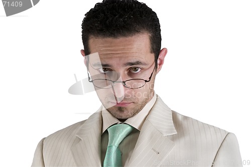 Image of Businessman looking over his glasses