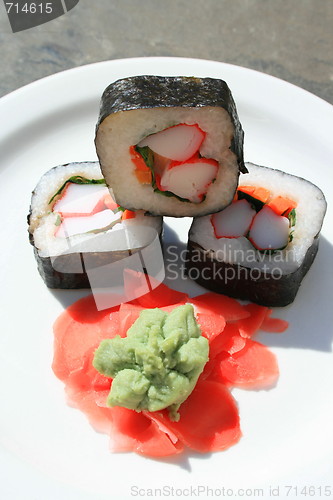 Image of Sushi next to Wasabi and Sushi Ginger