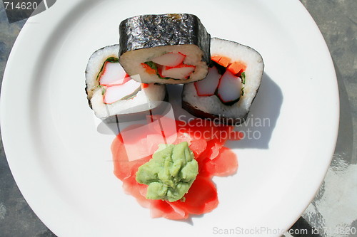 Image of Sushi next to Wasabi and Sushi Ginger