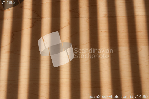 Image of shadow bars on the parquet