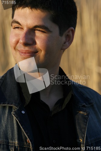 Image of Young handsome man smiling