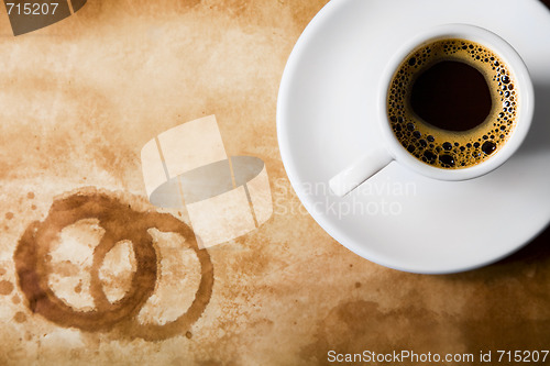 Image of  Coffee on old paper with round coffee stains