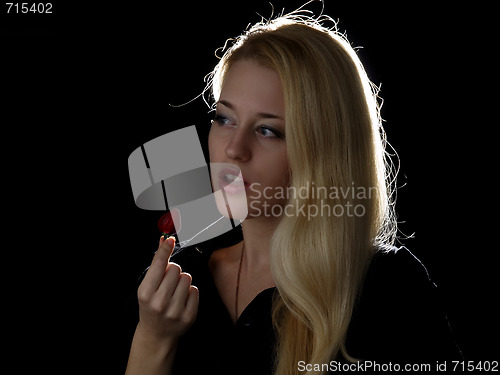 Image of Girl eating strawberry