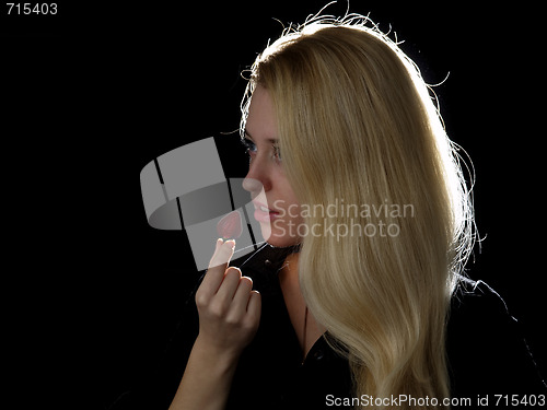 Image of Girl eating strawberry