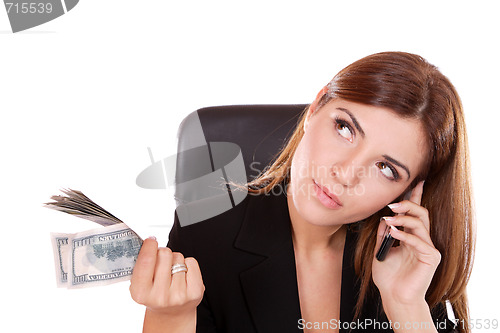 Image of young woman holding money in the hand