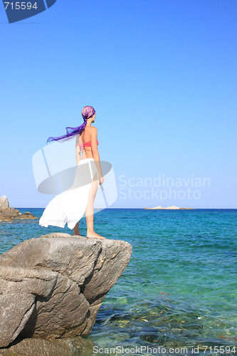 Image of tanned woman in bikini in the sea