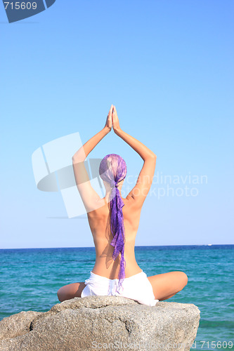 Image of tanned woman in bikini in the sea