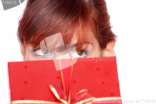 Image of winter portrait of a beautiful young smiling woman