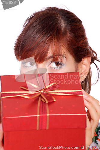 Image of winter portrait of a beautiful young smiling woman