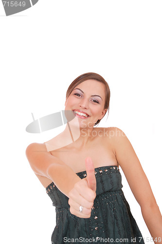 Image of beautiful young woman showing thumbs up sign