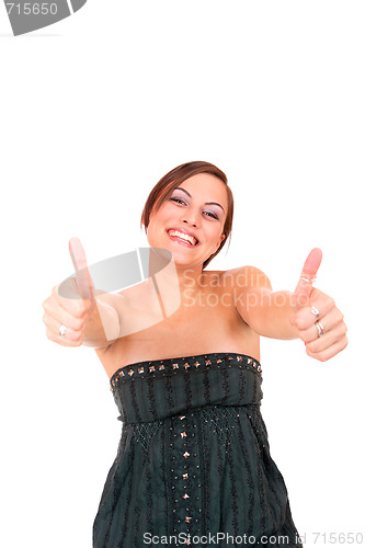 Image of beautiful young woman showing thumbs up sign