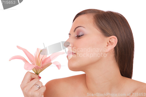 Image of Beautiful woman with flower isolated on white