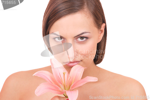 Image of Beautiful woman with flower isolated on white