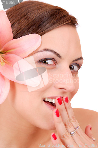 Image of Beautiful woman with flower isolated on white
