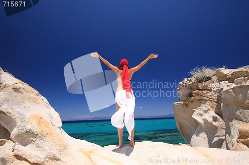 Image of tanned woman in bikini in the sea