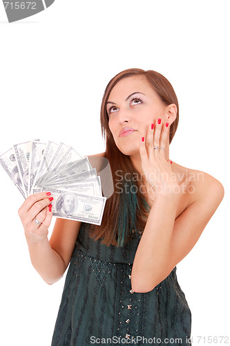 Image of Attractive woman takes lot of 100 dollar bills