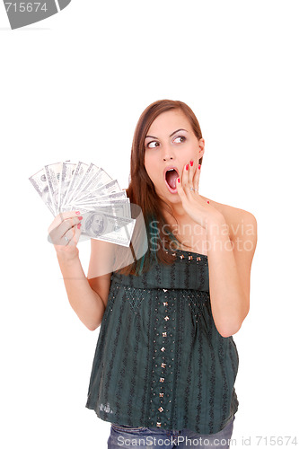 Image of Attractive woman takes lot of 100 dollar bills
