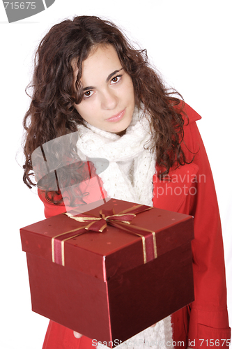 Image of winter portrait of a beautiful young smiling woman