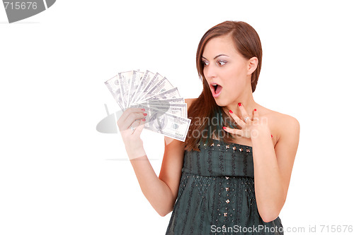 Image of Attractive woman takes lot of 100 dollar bills