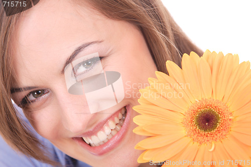 Image of Beautiful woman with flower isolated on white