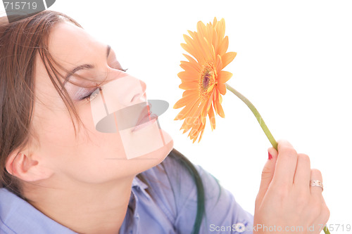 Image of Beautiful woman with flower isolated on white