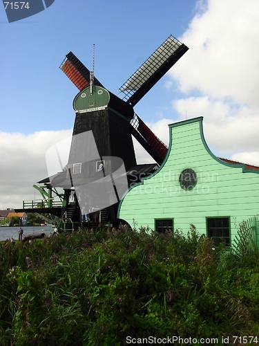 Image of Windmill and storage house.