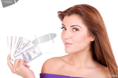 Image of young woman holding money in the hand