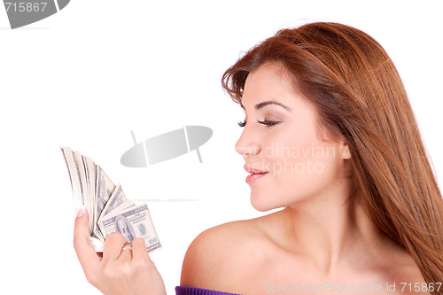 Image of young woman holding money in the hand