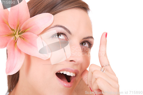 Image of Beautiful woman with flower isolated on white
