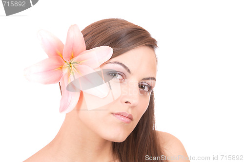 Image of Beautiful woman with flower isolated on white