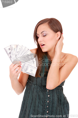 Image of Attractive woman takes lot of 100 dollar bills