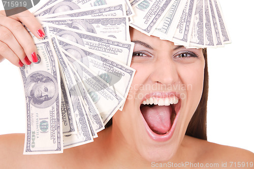 Image of Attractive woman takes lot of 100 dollar bills