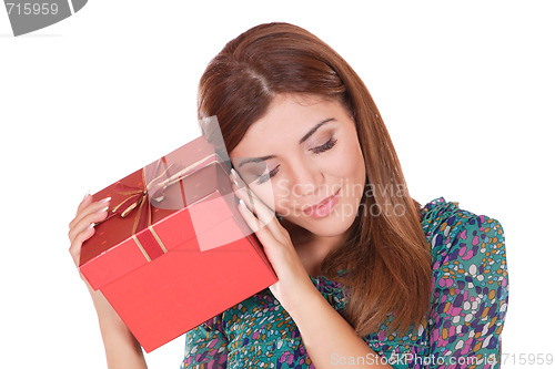 Image of winter portrait of a beautiful young smiling woman