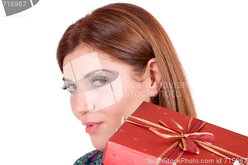 Image of winter portrait of a beautiful young smiling woman