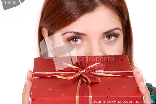 Image of winter portrait of a beautiful young smiling woman