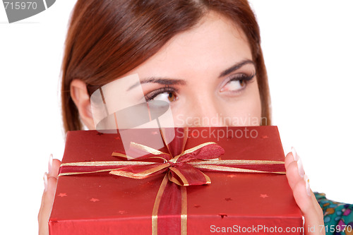 Image of winter portrait of a beautiful young smiling woman