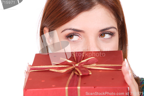 Image of winter portrait of a beautiful young smiling woman