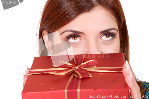 Image of winter portrait of a beautiful young smiling woman