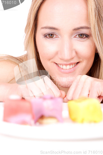 Image of Attractive woman with a cake