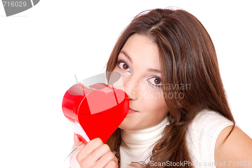 Image of winter portrait of a beautiful young smiling woman