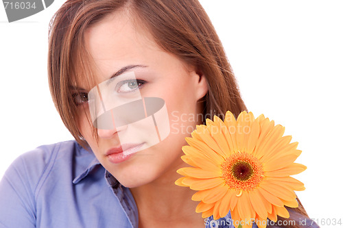 Image of Beautiful woman with flower isolated on white