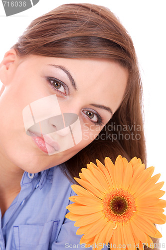 Image of Beautiful woman with flower isolated on white