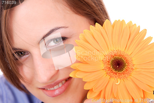 Image of Beautiful woman with flower isolated on white
