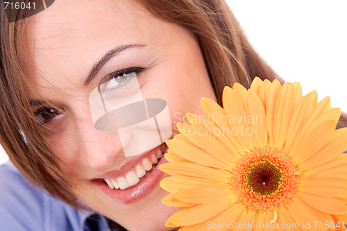 Image of Beautiful woman with flower isolated on white