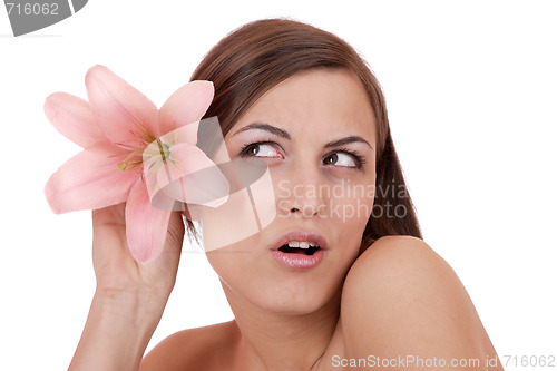 Image of Beautiful woman with flower isolated on white