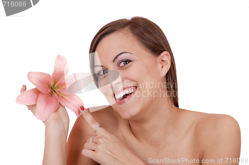 Image of Beautiful woman with flower isolated on white