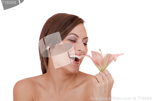 Image of Beautiful woman with flower isolated on white