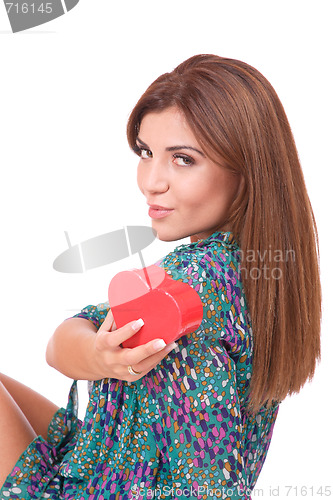 Image of winter portrait of a beautiful young smiling woman