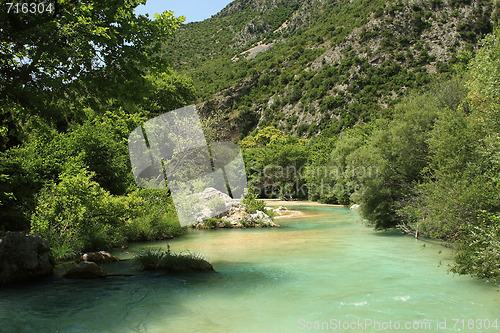 Image of Landscape with mountains, forest and river